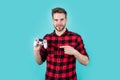 Video games addicted young guy play with console. man playing video game with controller. bearded man using virtual