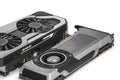 two Video Graphics cards with powerful GPU isolated on white background. Might be used to mine cryptocurrencies. Closeup photo wi