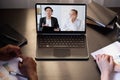video interview remote meeting colleagues laptop Royalty Free Stock Photo