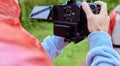 Video Making with the stabilizer. Man recording a video with a slr camcoder. Royalty Free Stock Photo
