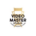 Video Master logo. Video production studio emblem. Letters and director armchair.