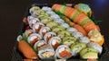 Video of a platter of sushi rolls with both raw and cooked ingredients 1080p HD