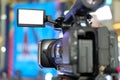 video production camera recording live event on stage. television social media broadcasting seminar conference Royalty Free Stock Photo