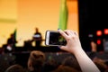 Video recording on a mobile phone, concert show Royalty Free Stock Photo