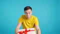 Happy and unbelieving man has received a big present