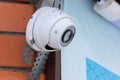 Video surveillance system on the wall of the house. Outdoor surveillance. CCTV