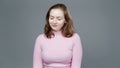 Video of woman in pink turtleneck with selflove