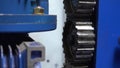 Close-up footage of working metal`s corrugated machine