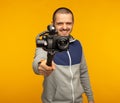 Videographer or blogger man pointing camera with gimbal Royalty Free Stock Photo