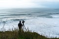 videographer filming surfers in Nazare
