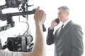 Videographer making video of businessman Royalty Free Stock Photo