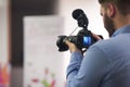 Videographer recording on conference Royalty Free Stock Photo