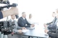 Videographer making video of business people Royalty Free Stock Photo