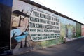 `Viele Kleine Leute, Die in Vielen Kleinen Orten...` East Side Gallery Art Royalty Free Stock Photo