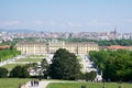 VIENNA, AUSTRIA - APR 30th, 2017: Classic view of famous Schonbrunn Palace with Great Parterre garden with people Royalty Free Stock Photo