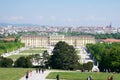 VIENNA, AUSTRIA - APR 30th, 2017: Classic view of famous Schonbrunn Palace with Great Parterre garden with people Royalty Free Stock Photo