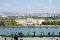 VIENNA, AUSTRIA - APR 30th, 2017: Classic view of famous Schonbrunn Palace with Great Parterre garden with people Royalty Free Stock Photo