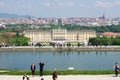 VIENNA, AUSTRIA - APR 30th, 2017: Classic view of famous Schonbrunn Palace with Great Parterre garden with people Royalty Free Stock Photo