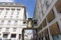 Art Nouveau anchor clock between houses above the street on the Hoher Markt in Vienna