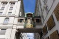 Art Nouveau anchor clock between houses above the street on the Hoher Markt in Vienna