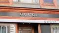 Vienna, Austria - April 22, 2023: Close-up sign of the Gucci boutique in the city center