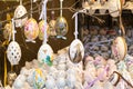 Different colorful painted Easter eggs on the tree at traditional European market Royalty Free Stock Photo