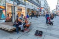 Female street musicians perform for passersby to enjoy in exchange of small donation