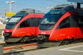 Vienna, Austria - 19 April 2012: Two red trains at Vienna South Station. Railway terminus