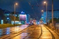 Vienna, Austria - August 22, 2022: City streets on a rainy night with tram railway Royalty Free Stock Photo