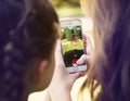 Vienna, AUSTRIA - August 1, 2016: Little girls playing a Pokemon