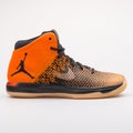 Nike Air Jordan XXXI orange and black sneaker Royalty Free Stock Photo