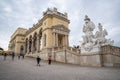 Vienna, Austria - August 20, 2022: Tourists at Schoenbrunn Castle near Gloriette Cafe building