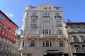 beautiful white stucco elevation and balconies of the renovated old Johann Strauss hotel Royalty Free Stock Photo
