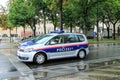 The car of Austrian Federal Police on the street of Vienna during the rain. Bundespolizei