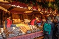 Vienna, Austria - 11.23.2019 : Christmas food sweets donut kiosk stand on a winter market