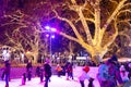 VIENNA, AUSTRIA - DEC 18, 2018: People skating at the ice rink near the Rathaus Palace near to famouse Christmas market in Wien Royalty Free Stock Photo