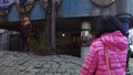 VIENNA, AUSTRIA - DECEMBER, 24, 2016 Muslim female tourists making photos near famous expressionist Hundertwasser House