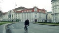 VIENNA, AUSTRIA - DECEMBER, 24 Wiener Konzerthaus, famous concert hall, behind lonely cyclist. Popular touristic