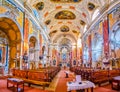 Panorama of richly decorated prayer hall of Schottenkirche Scots Church, on February 17 in Vienna, Austria