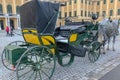VIENNA, AUSTRIA - 22-10-2018: Horse - drawn carriage or Fiaker, popular tourist attraction, on Michaelerplatz and Hofburg Palace