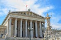 Beautiful view of Austrian parliament building with famous Pallas Athena fountain in Vienna, Austria Royalty Free Stock Photo
