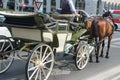 Vienna / Austria - 31 July 2019: Coach driving in the streets of vienna, Austria with the baroque carriage vehicle with horses for Royalty Free Stock Photo