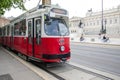 Vienna, Austria - July 15, 2013: Old tram carrying passengers near Austrian Parliament Royalty Free Stock Photo