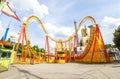 Super wide view of a colorful roller coaster in Prater amusement park at Vienna. Austria