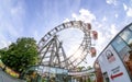 Wide angle view of Big ferris wheel Riesenrad in amusement park and section of the Wiener Prater in Vienna Royalty Free Stock Photo