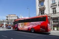 Vienna, Austria - June 13, 2023: An ardent red bus on Vienna Street