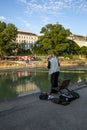 A fisherman catches fish on the Danube Canal embankment in Vienna
