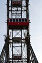 VIENNA, AUSTRIA - MARCH 18, 2016: The red cabin of oldest Ferris Wheel in Prater park on sky background Vienna Prater Wurstelprat Royalty Free Stock Photo