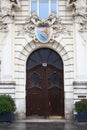 Fragment of a baroque house with a coat of arms above the entrance, Vienna, Austria