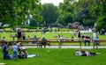 VIENNA, AUSTRIA - MAY 26: People are resting and relaxing in public Stadtpark park in warm sunny day in Vienna, Austria, on May 26